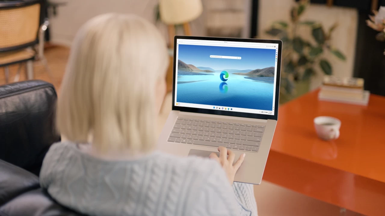 Microsoft is ending Edge support on one operating system this A woman with a laptop running Microsoft Edge