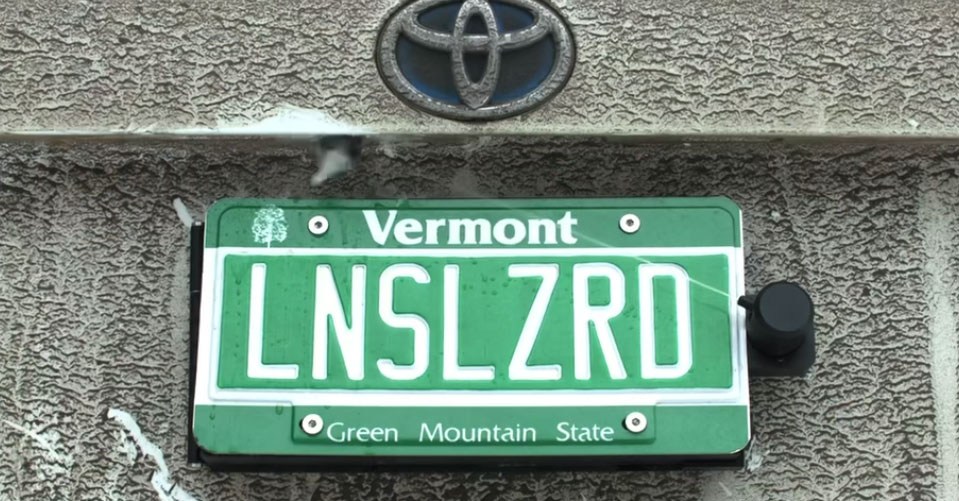This backup camera cleaner hides behind your license plate This backup camera cleaner hides behind your license plate
