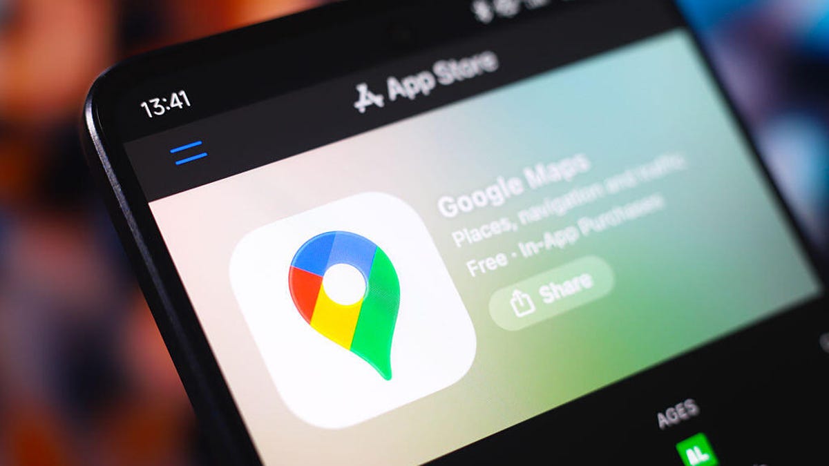 Gemini Rolls Out Ask Maps to Make Google Maps More A phone shows a download ready for Google Maps.