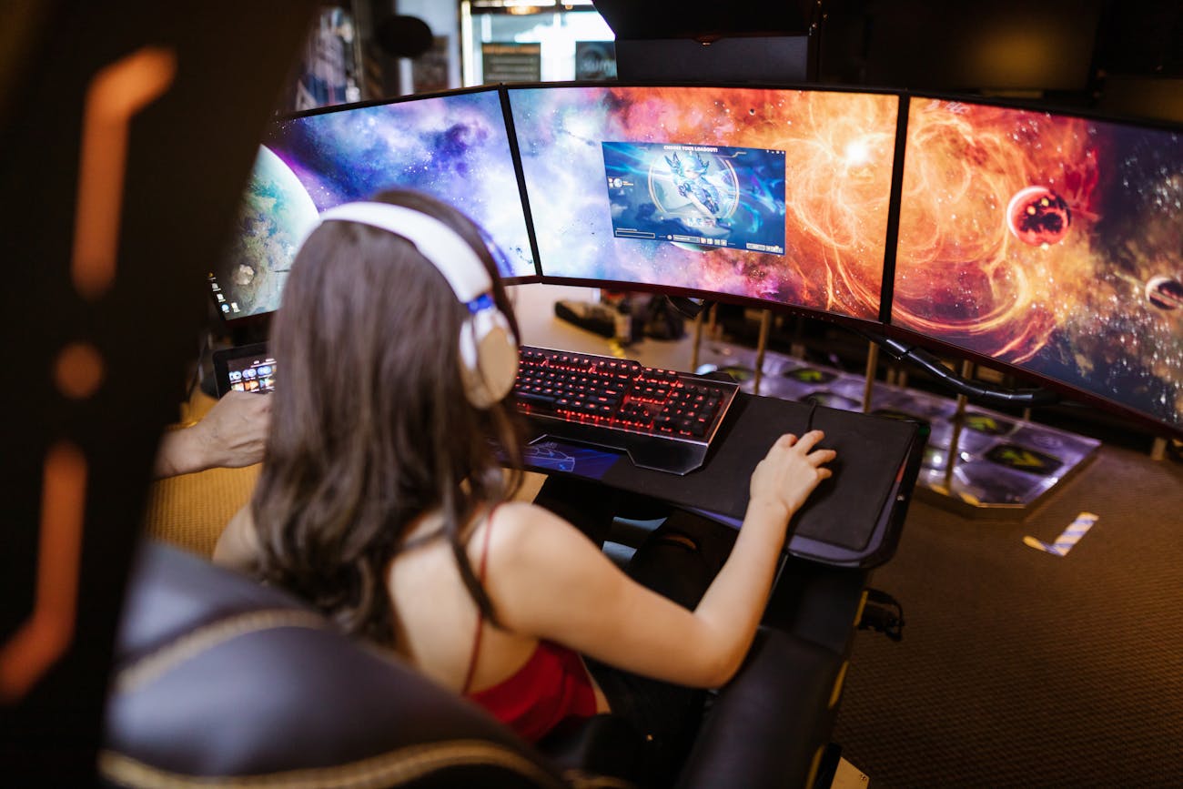 Why Savvy Gamers Are Embracing Digital Marketplaces for Gear and A person gaming on a desktop